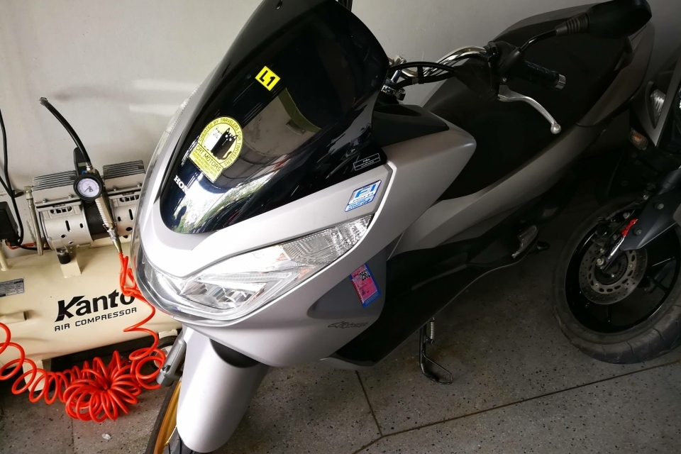 Honda PCX 150cc or similar